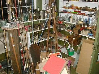 A display of antique glassware and collectables