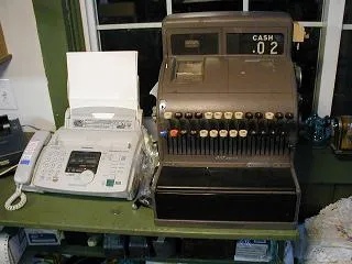 An antique brass cash register